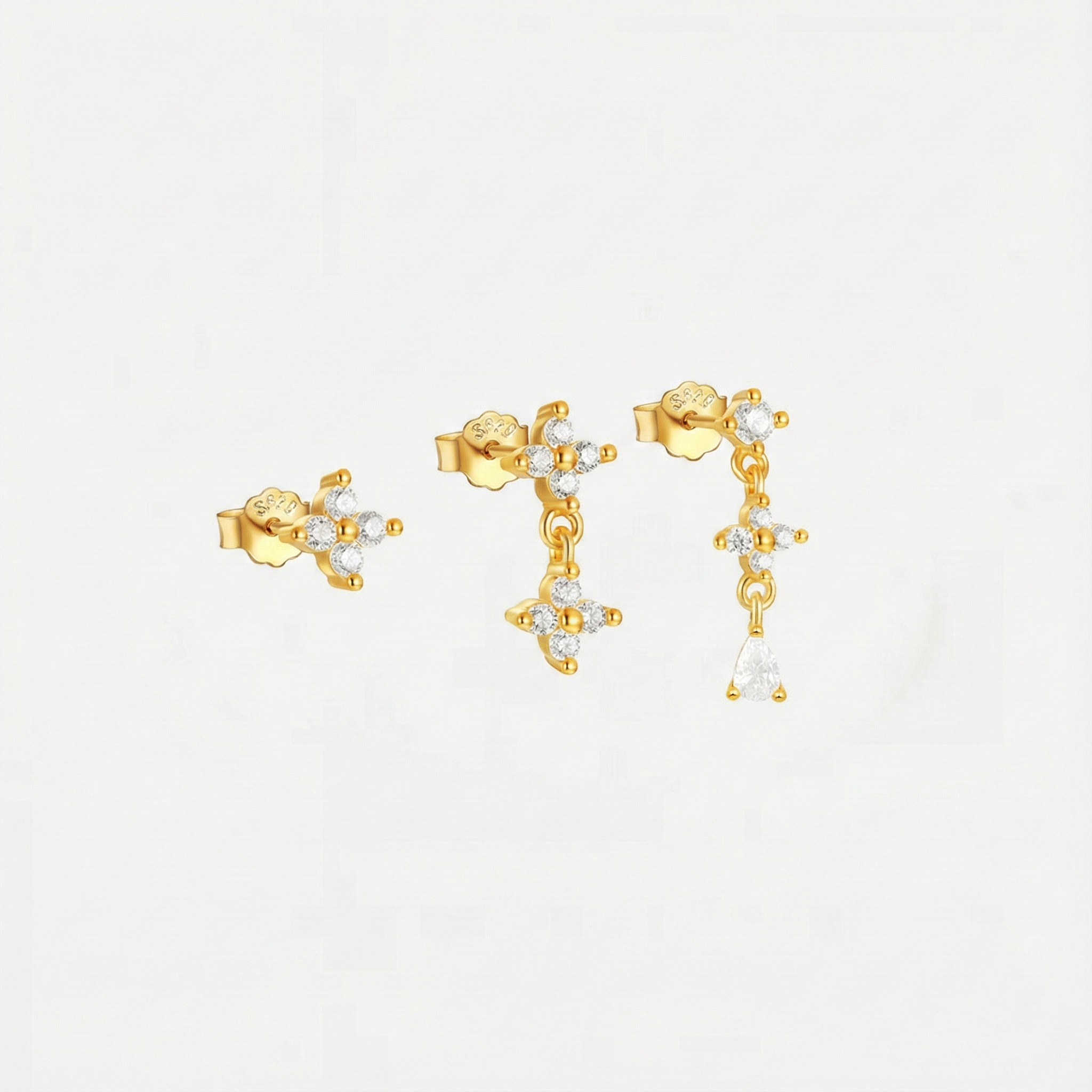 Anika – Guldøreringe med en delikat bevægelse.